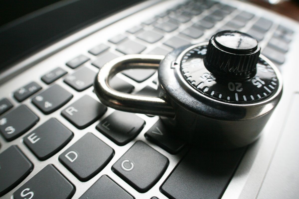 Cyber Security With Black Lock On Laptop Keyboard Protecting Your Information